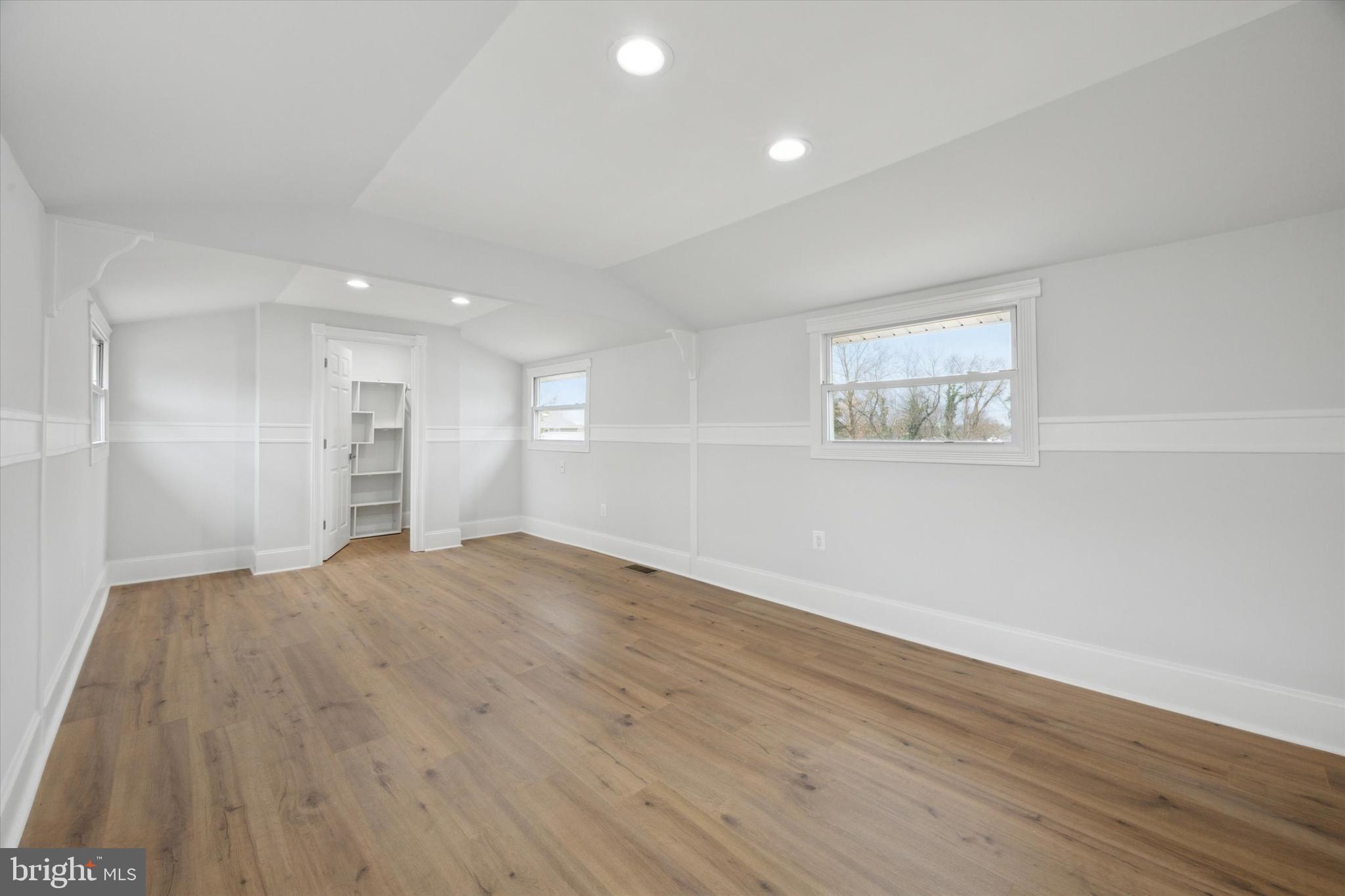 2124 Arleigh Road Cinnaminson, NJ 08077 - Photo 27 of 31 a view of empty room with wooden floor and fan