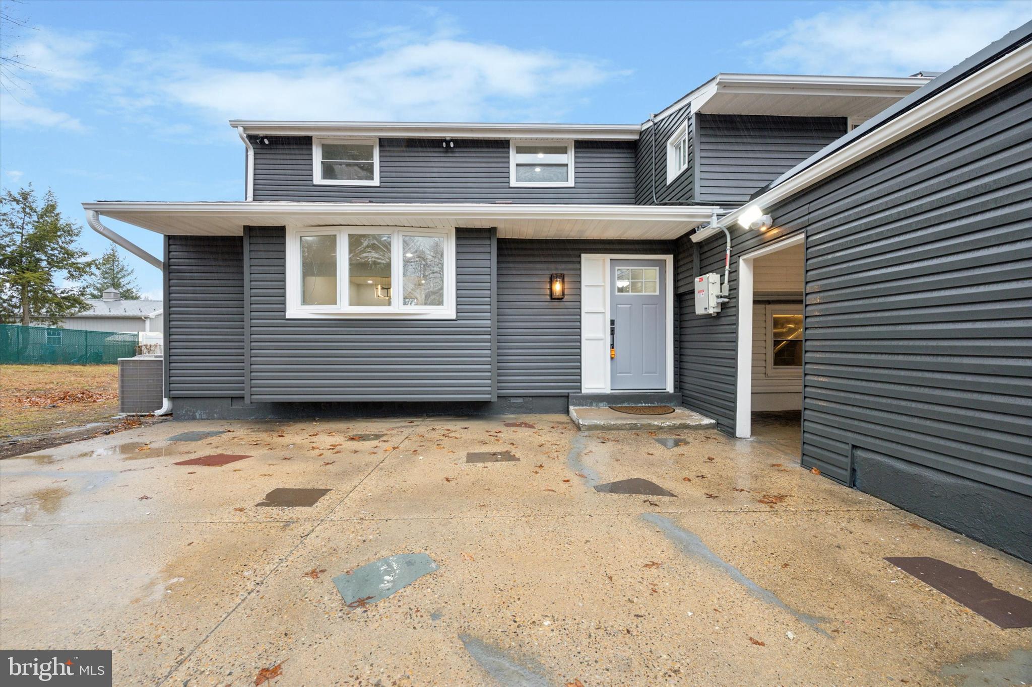 2124 Arleigh Road Cinnaminson, NJ 08077 - Photo 4 of 31 a front view of a house