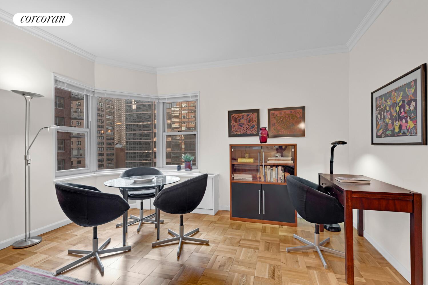 360 East 72nd Street, Unit B811 Manhattan, NY 10021 - Photo 3 of 15 a view of a dining room with furniture