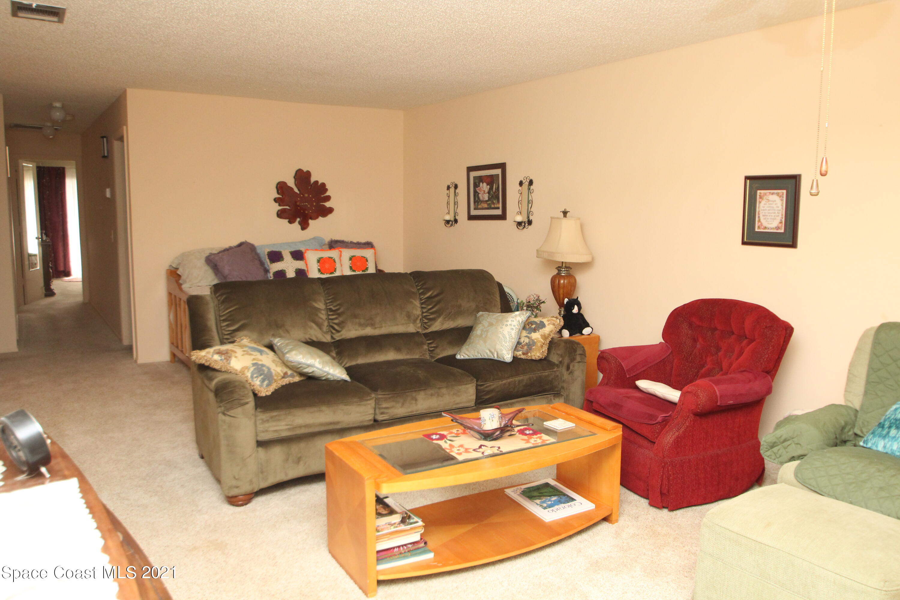 1691 Avery Road Northeast Palm Bay, FL 32905 - Photo 6 of 20 a living room with furniture