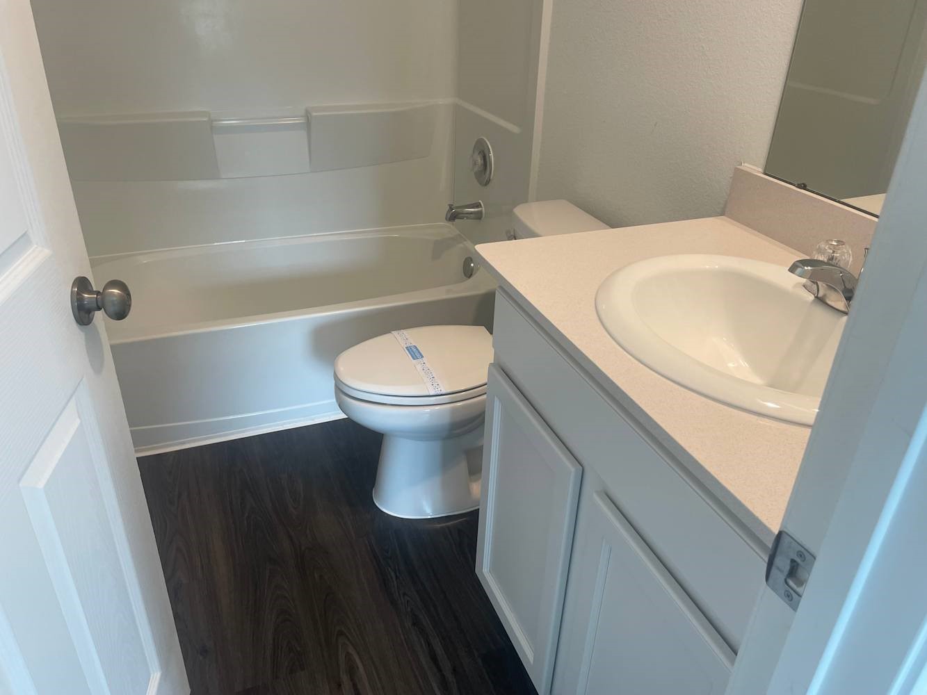 18788 Faustina Way New Caney, TX 77357 - Photo 7 of 9 a bathroom with a sink and a toilet