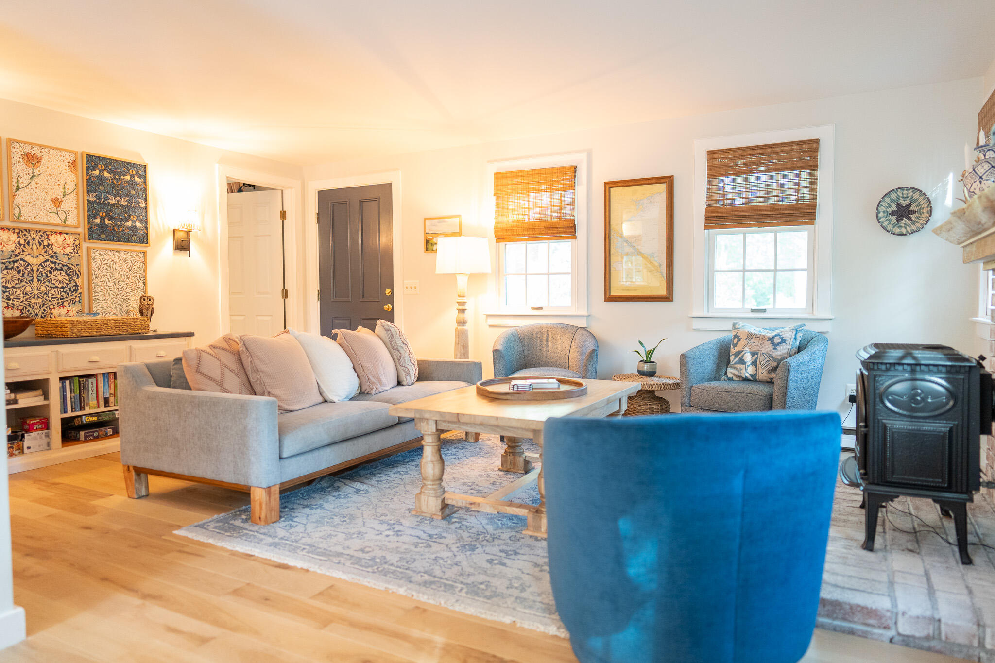 230 Massasoit Trail Eastham, MA 02642 - Photo 11 of 64 a living room with furniture and large windows