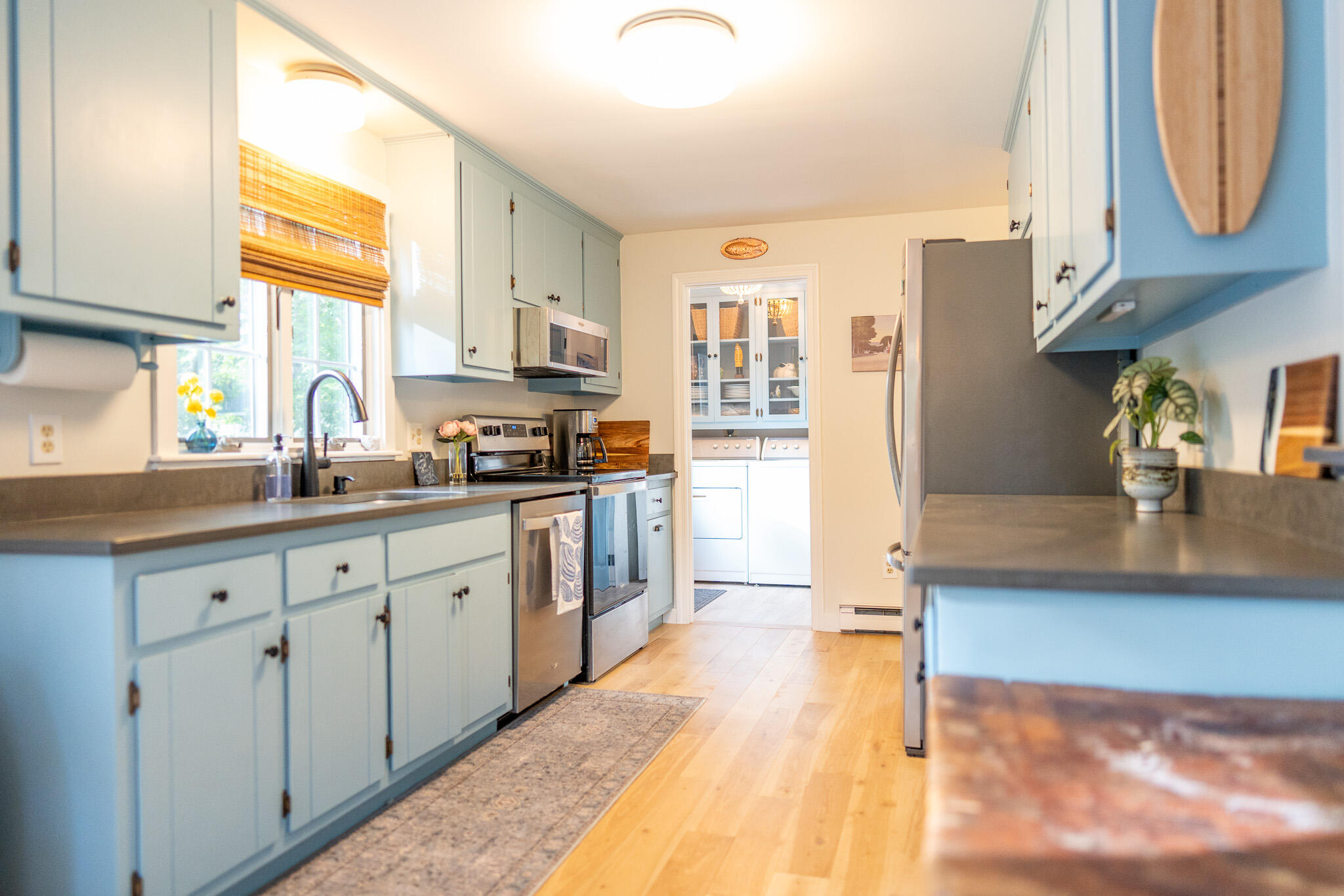 230 Massasoit Trail Eastham, MA 02642 - Photo 13 of 64 a kitchen with stainless steel appliances granite countertop a sink and a stove
