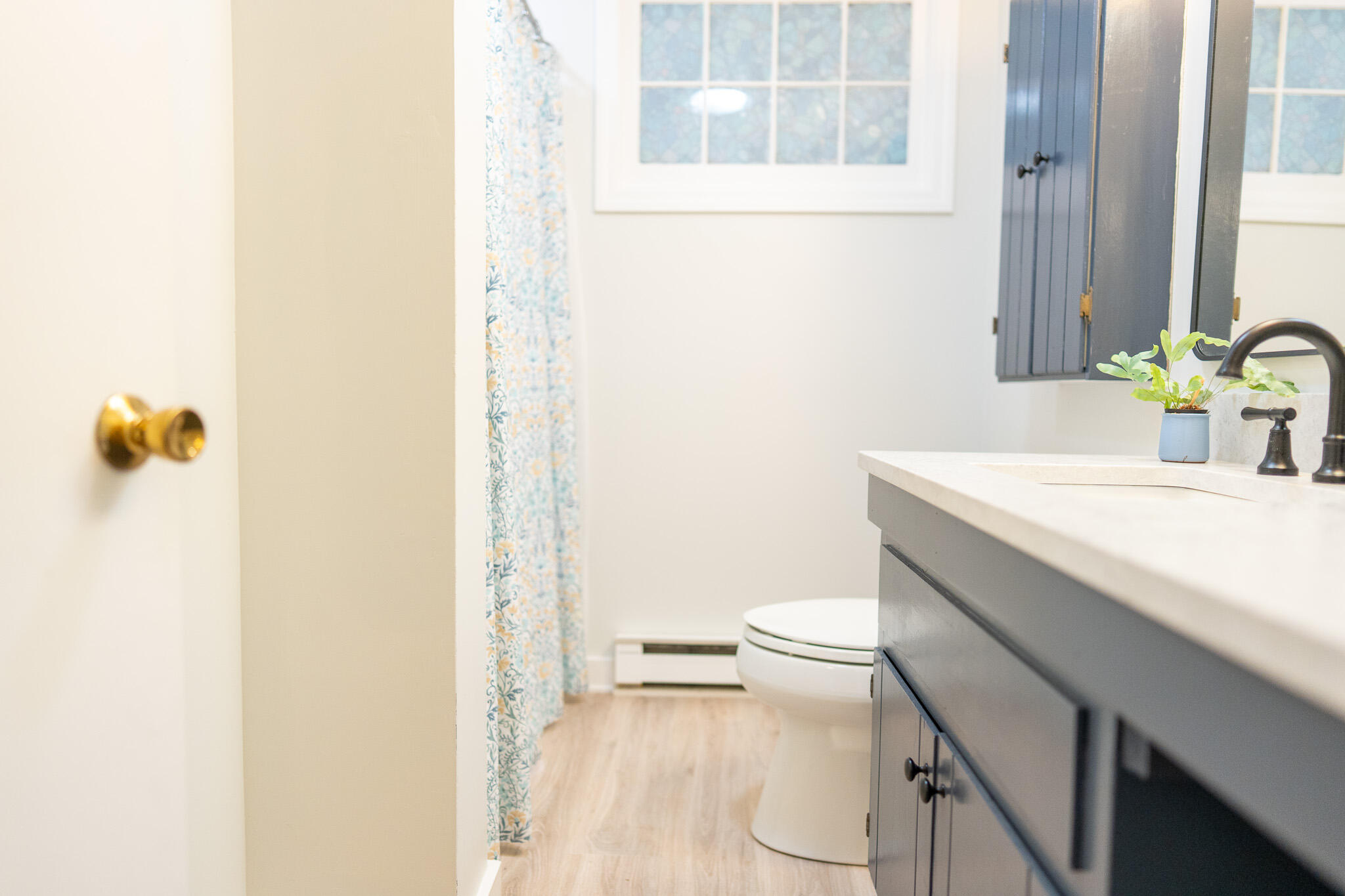 230 Massasoit Trail Eastham, MA 02642 - Photo 15 of 64 a bathroom with a sink a toilet and shower