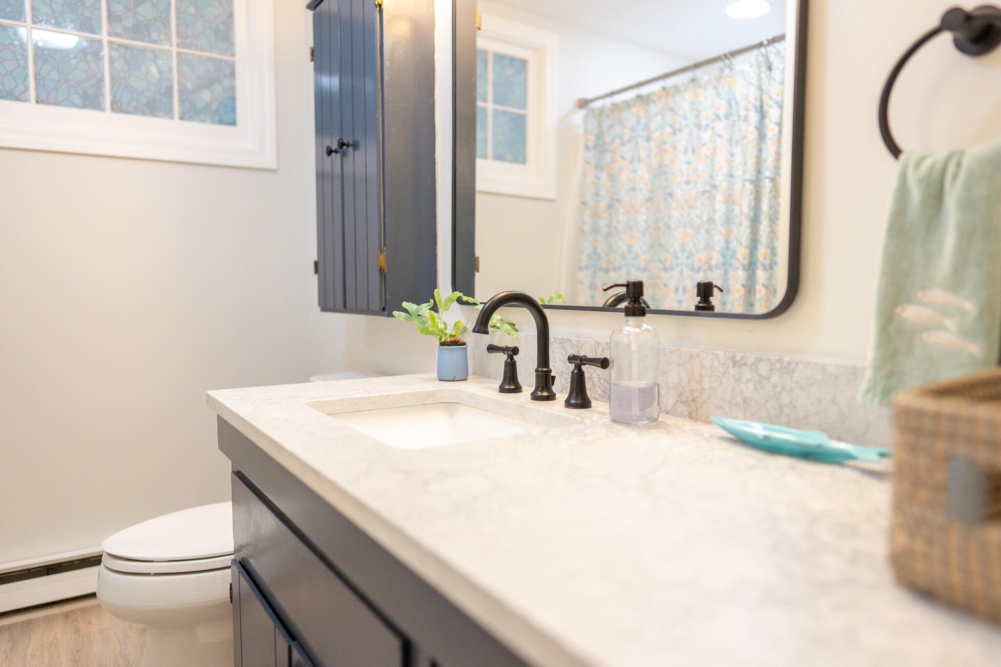 230 Massasoit Trail Eastham, MA 02642 - Photo 16 of 64 a bathroom with a sink and a toilet