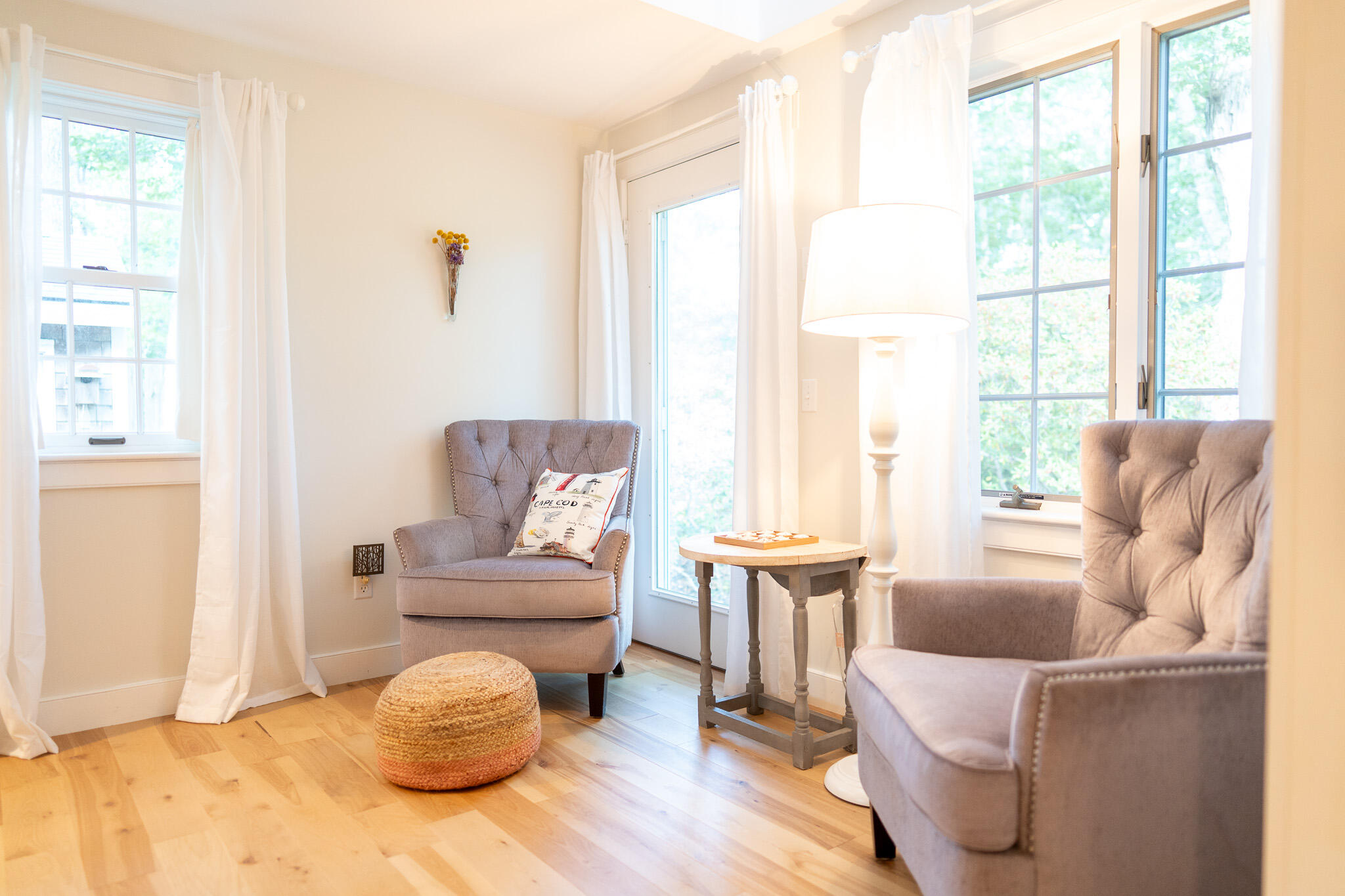 230 Massasoit Trail Eastham, MA 02642 - Photo 24 of 64 a living room with furniture and a large window