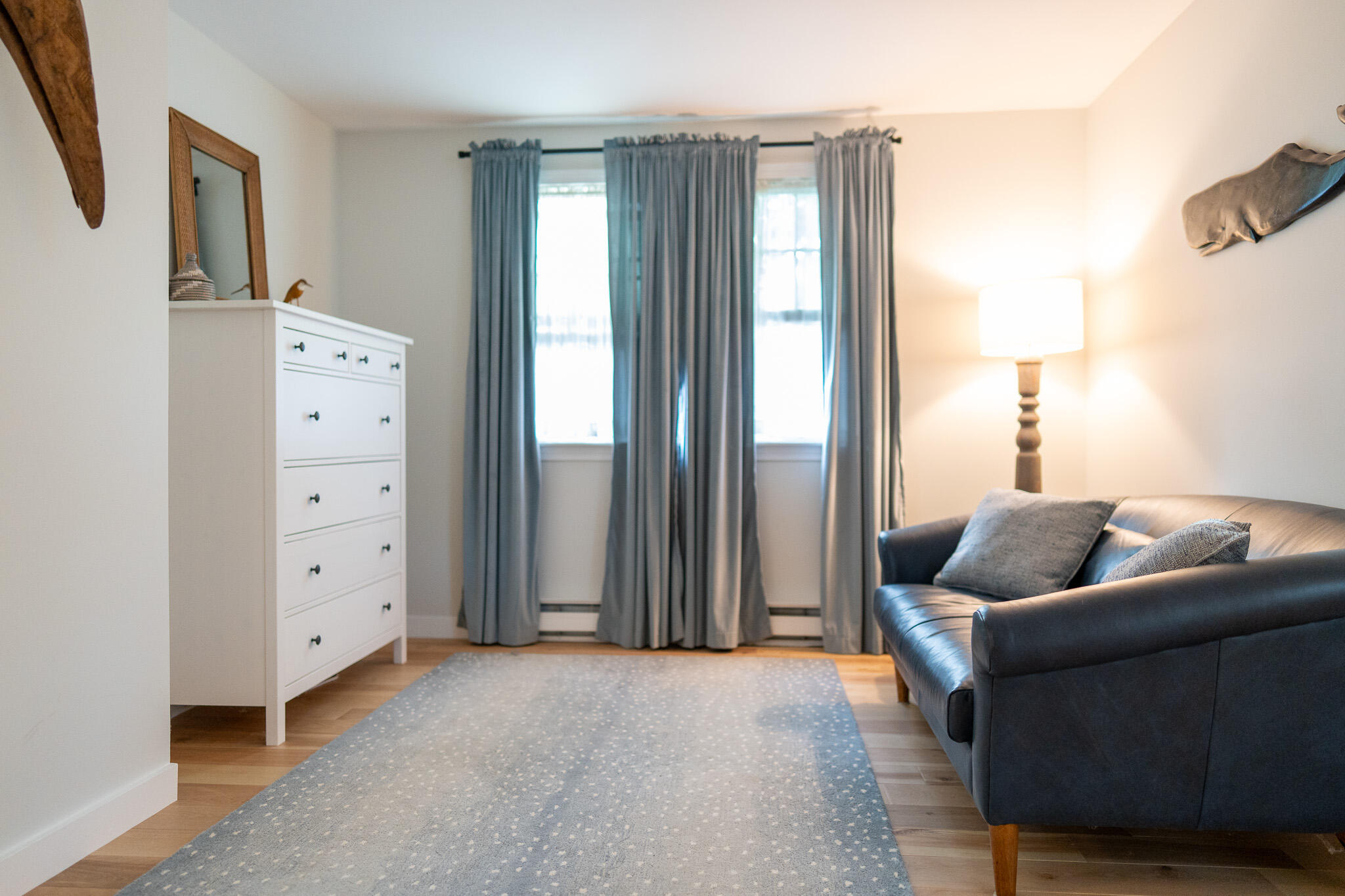 230 Massasoit Trail Eastham, MA 02642 - Photo 34 of 64 a living room with furniture and a large window