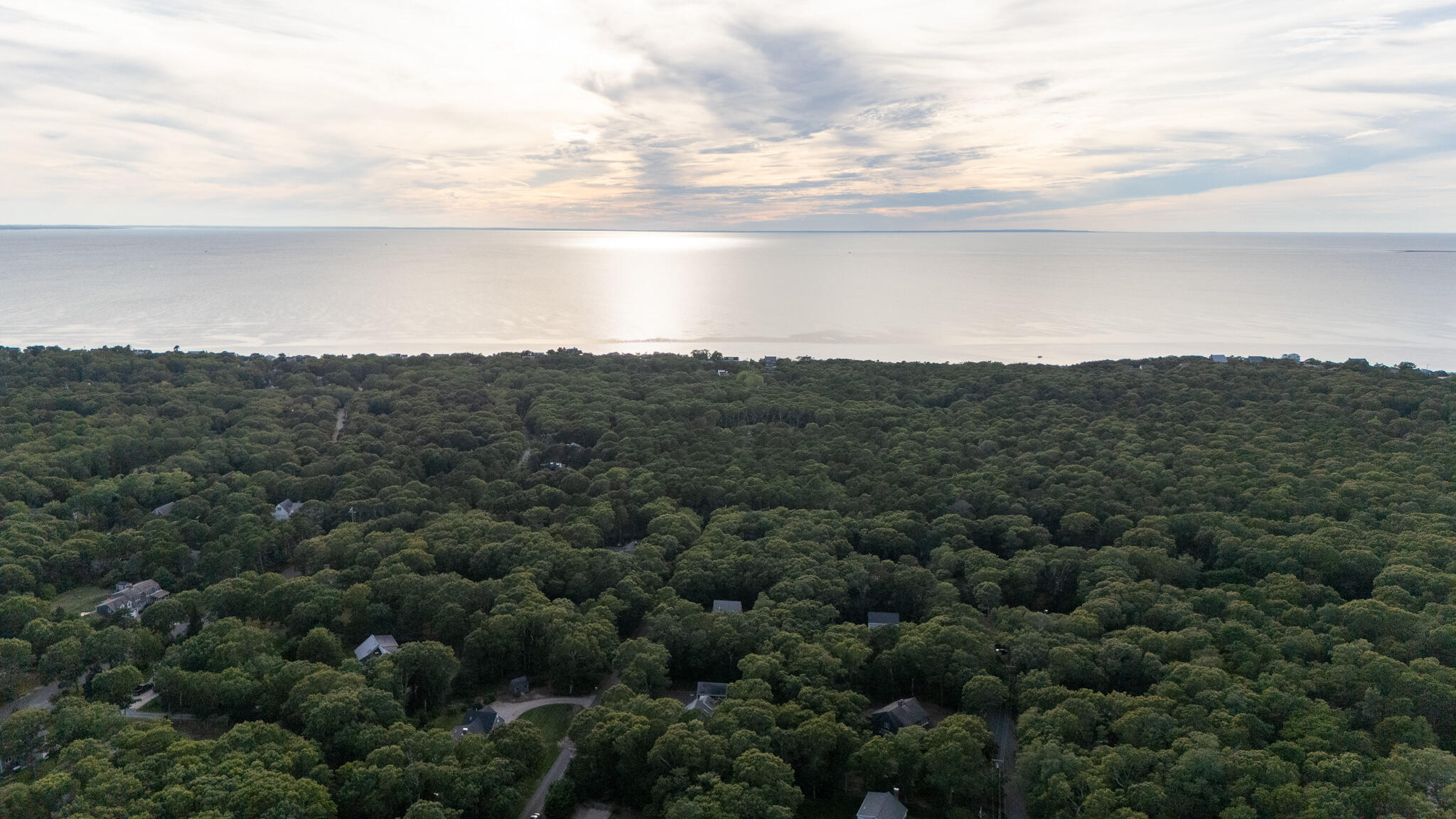 230 Massasoit Trail Eastham, MA 02642 - Photo 49 of 64 a view of a city and mountains in the background