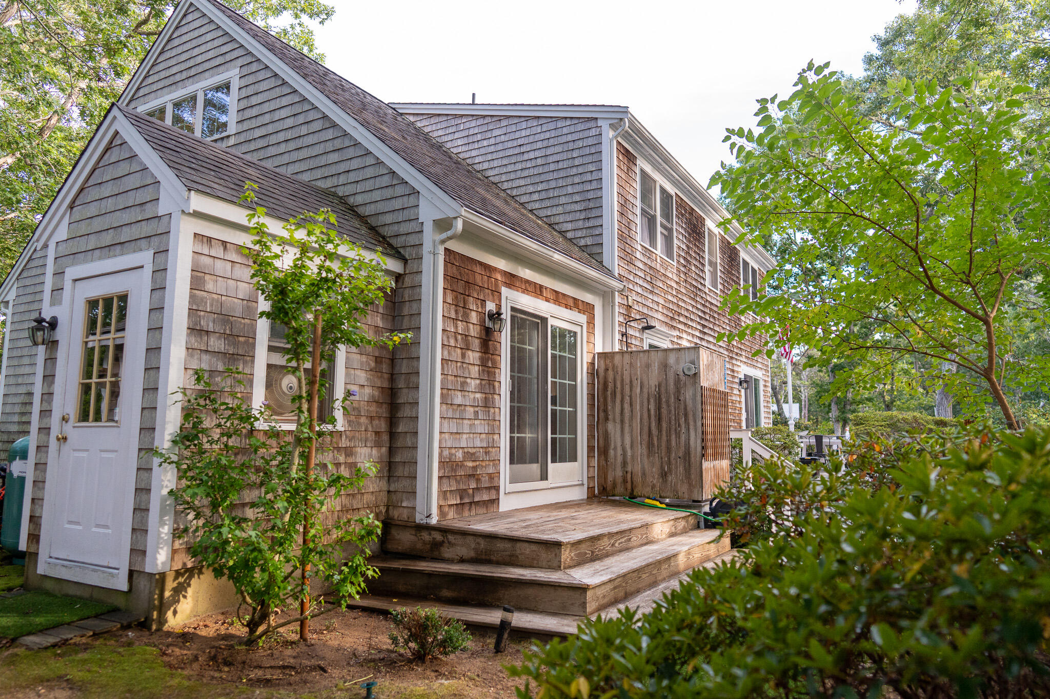 230 Massasoit Trail Eastham, MA 02642 - Photo 7 of 64 a backyard of a house with seating space