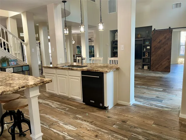 a view of a livingroom with furniture and window