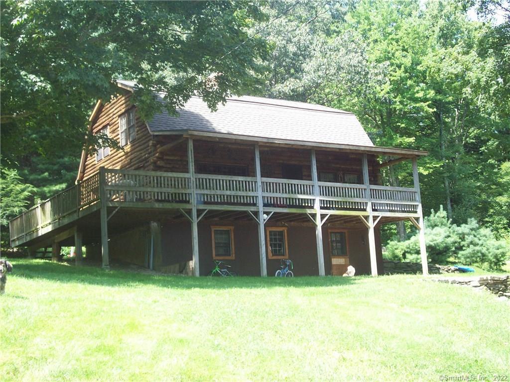 48 Graff Road Canterbury, CT 06331 - Photo 1 of 1 a front view of a house with a garden