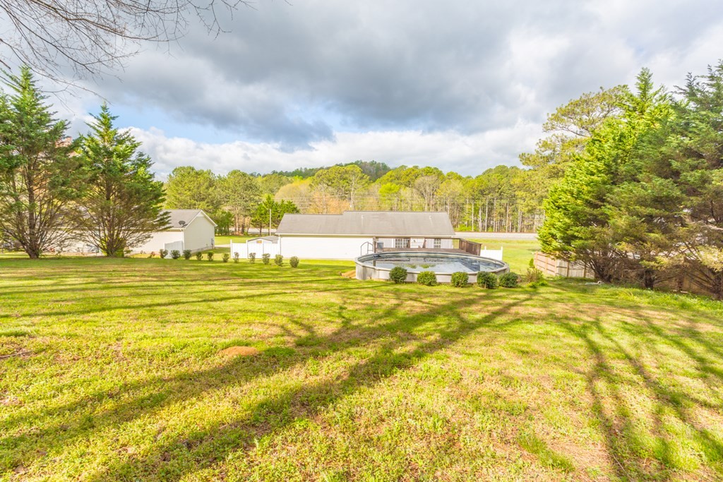 2322 Waring Road Northwest Dalton, GA 30721 - Photo 3 of 21 a view of a large swimming pool with an ocean view