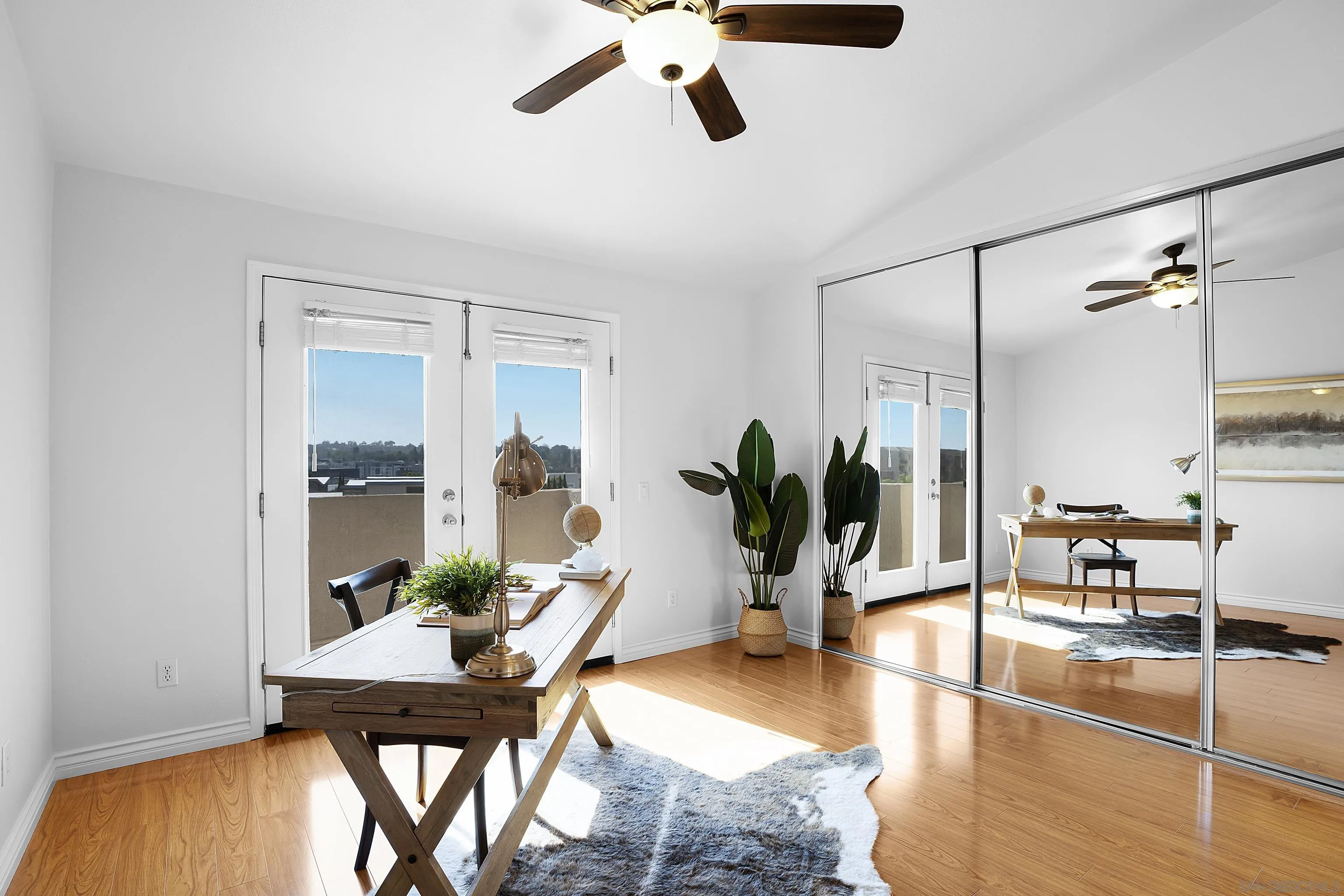 12646 Carmel Country Road, Unit 159 San Diego, CA 92130 - Photo 14 of 35 a living room with furniture and a floor to ceiling window