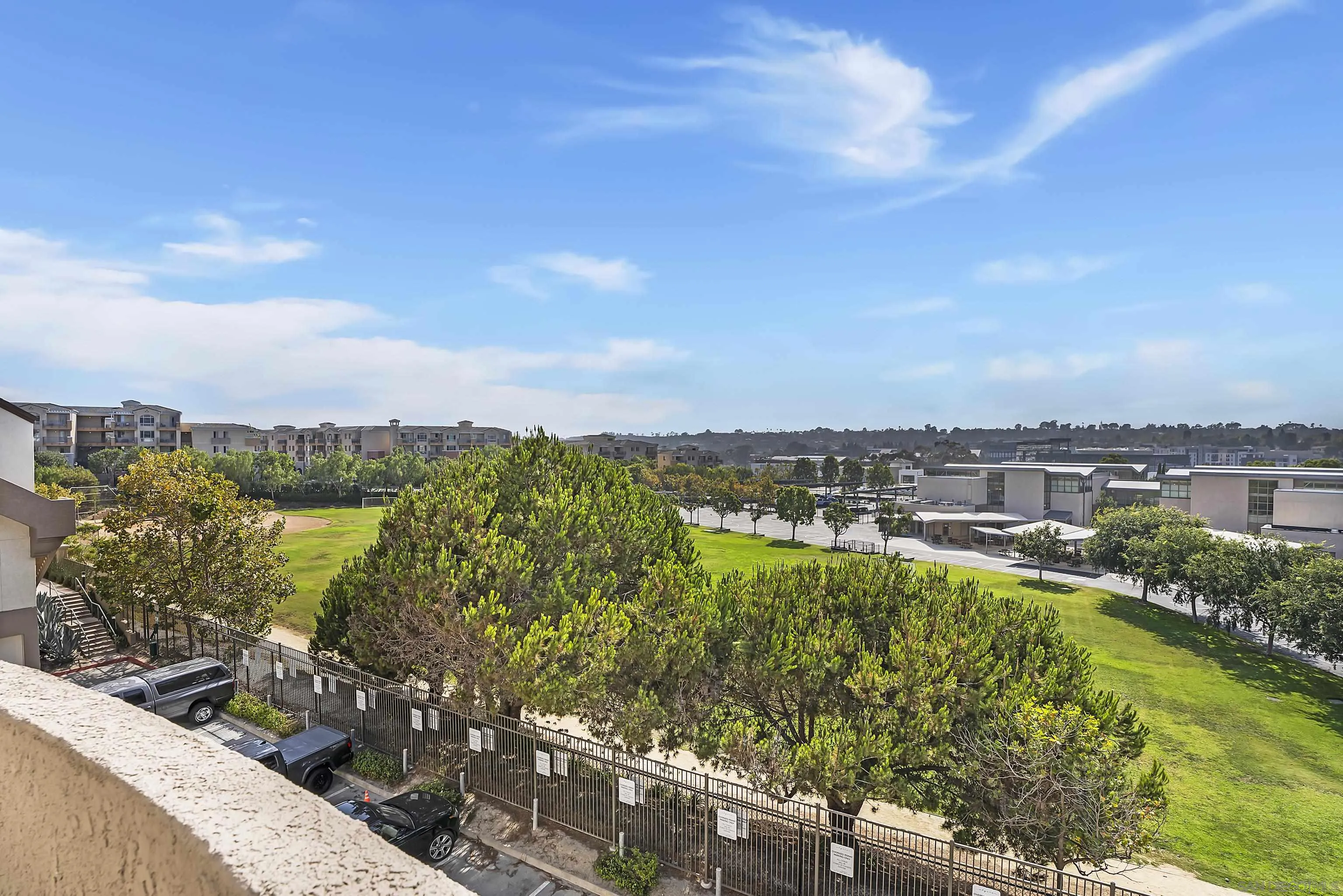 12646 Carmel Country Road, Unit 159 San Diego, CA 92130 - Photo 16 of 35 a view of a lake with a city