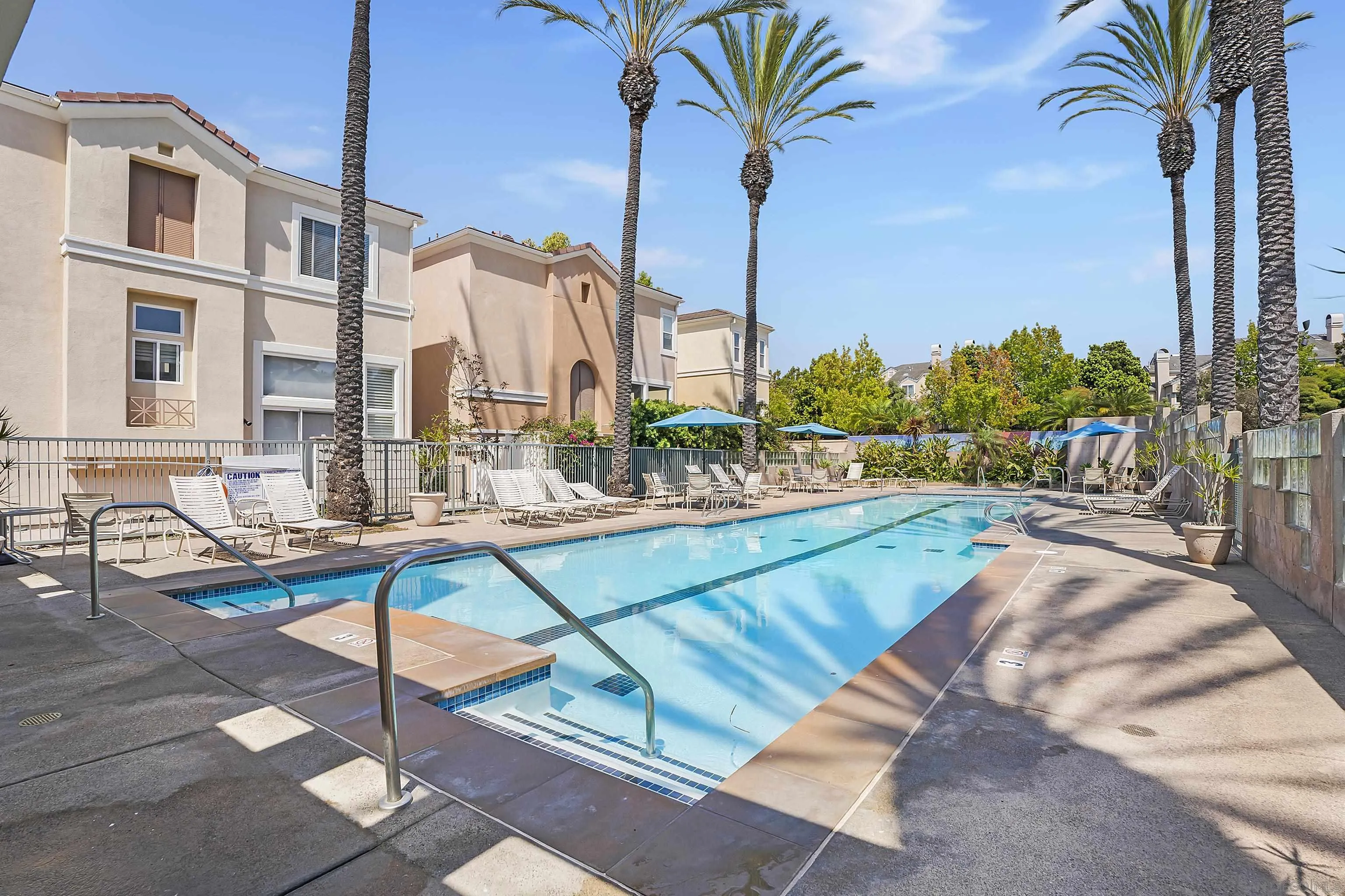 12646 Carmel Country Road, Unit 159 San Diego, CA 92130 - Photo 26 of 35 a view of swimming pool with chairs