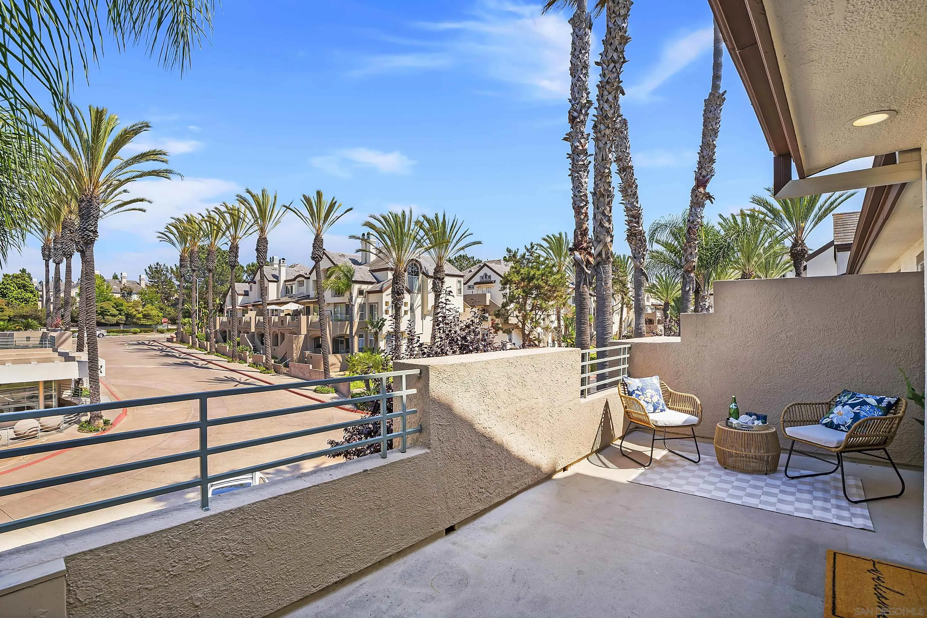 12646 Carmel Country Road, Unit 159 San Diego, CA 92130 - Photo 29 of 35 a view of a patio with swimming pool and sitting area