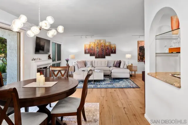 a kitchen with granite countertop a sink and a window