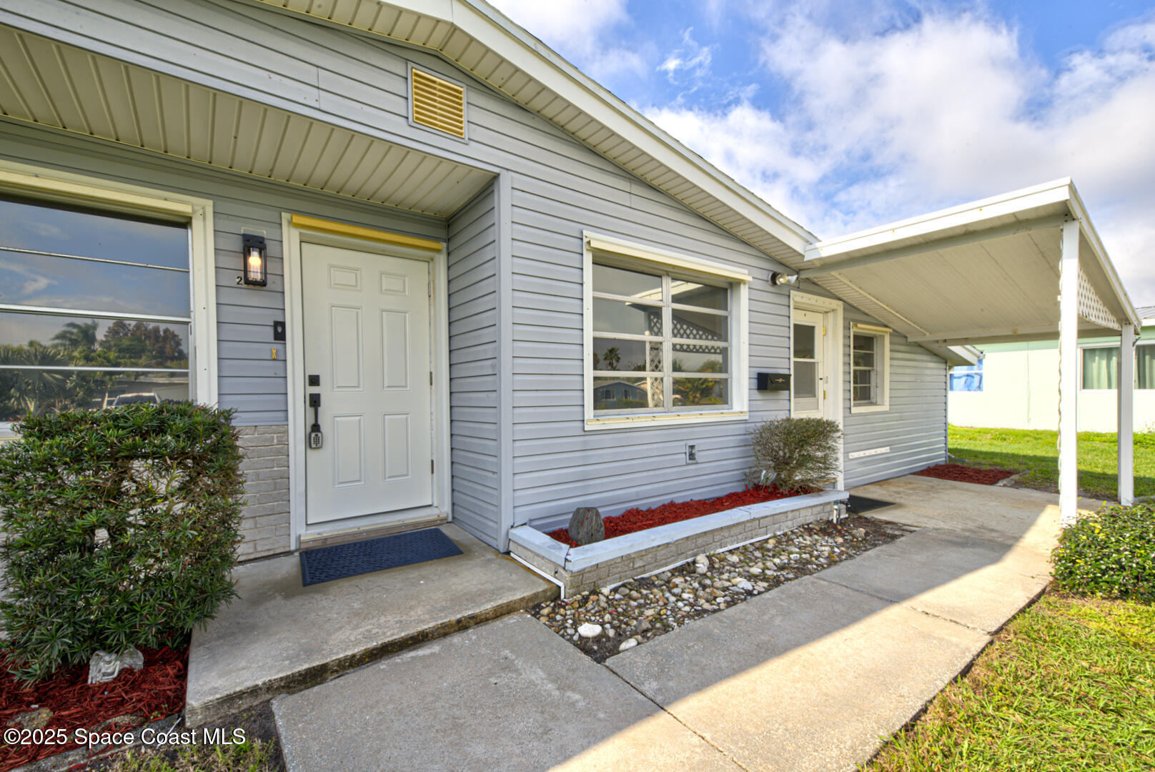 2433 Allan Adale Road Melbourne, FL 32935 - Photo 1 of 29 front door - Copy