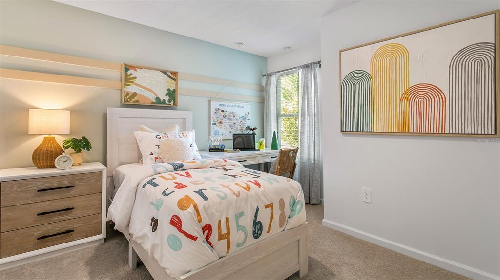 292 Palmetto Rdg Road St. Augustine, FL 32095 - Photo 20 of 37 a bedroom with a bed and a painting on the wall