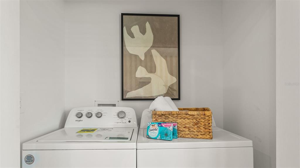 292 Palmetto Rdg Road St. Augustine, FL 32095 - Photo 24 of 37 a utility room with dryer and washer