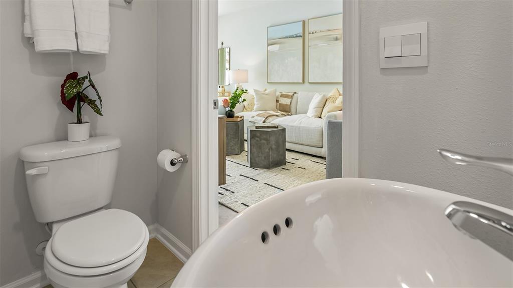 292 Palmetto Rdg Road St. Augustine, FL 32095 - Photo 25 of 37 a bathroom with a sink a toilet and a shower