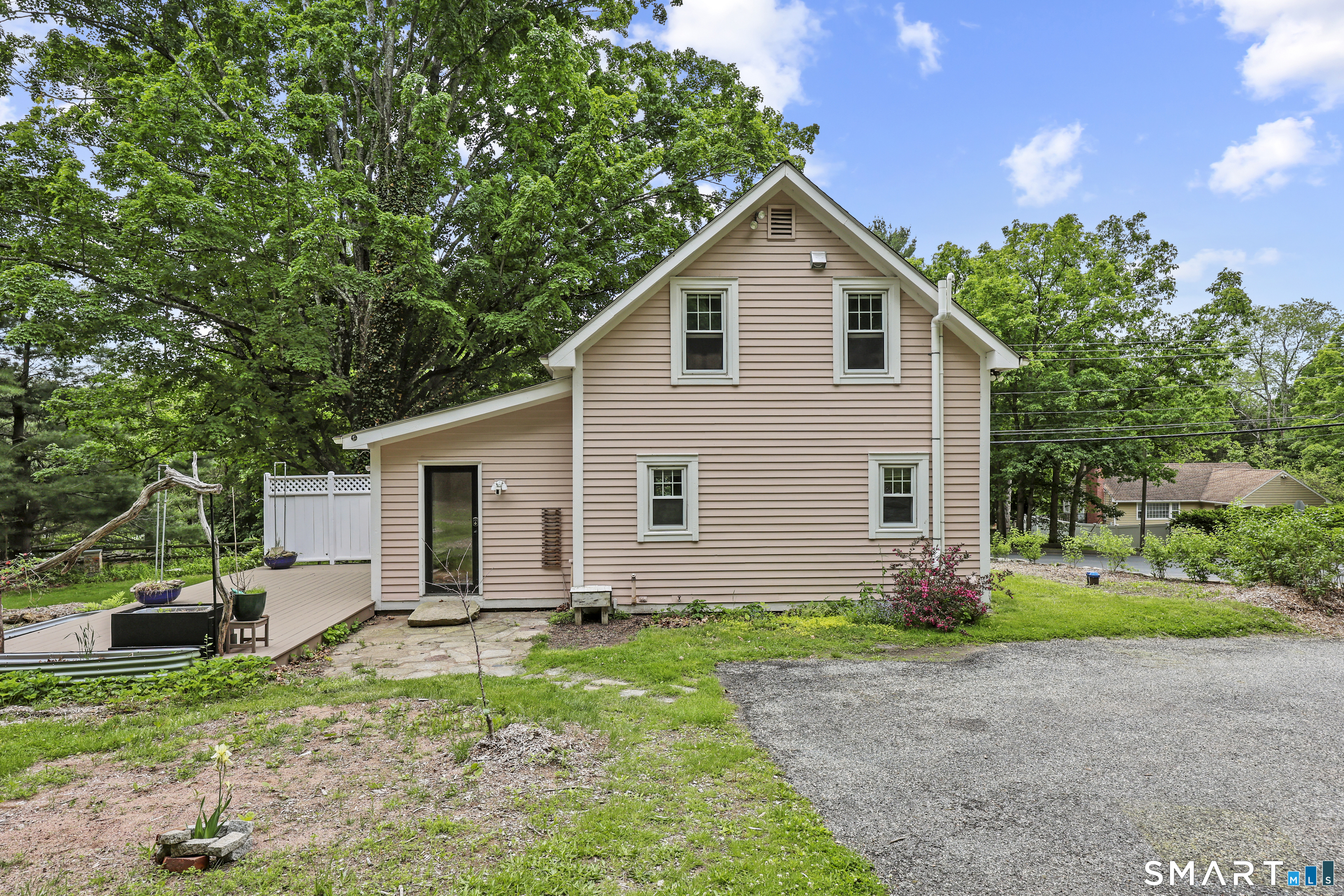 917 Hopewell Road Glastonbury, CT 06033 - Photo 29 of 39 a front view of house with yard and green space