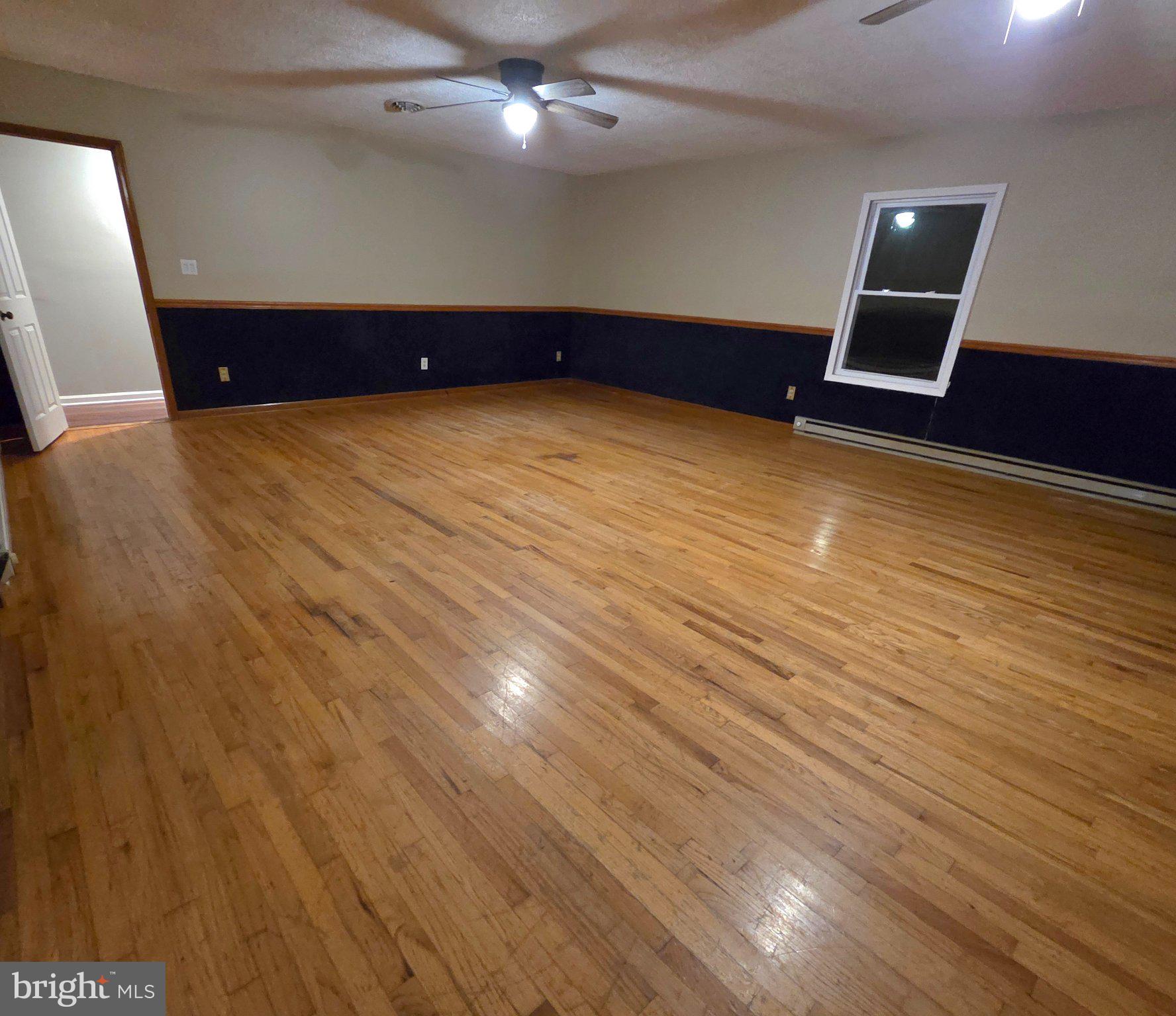 178 Payne Road Winchester, VA 22603 - Photo 57 of 101 20x26 family rm w/ fpl & beautiful wood floors