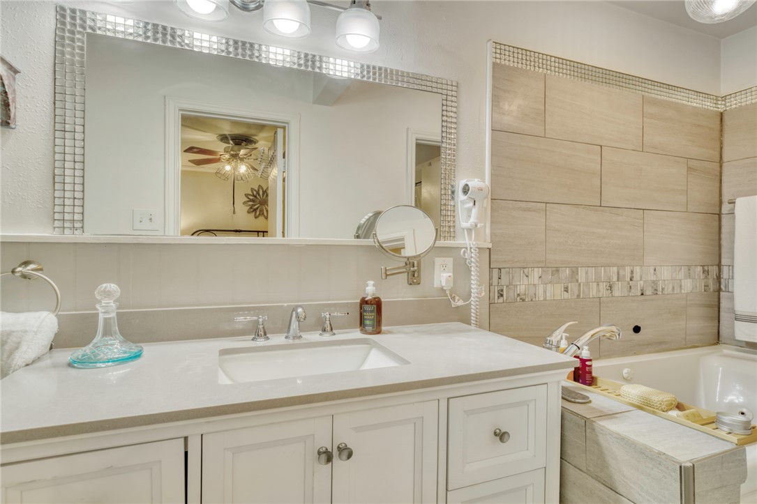 1681 Union Road Madisonville, TX 77864 - Photo 19 of 50 a bathroom with a sink and a mirror