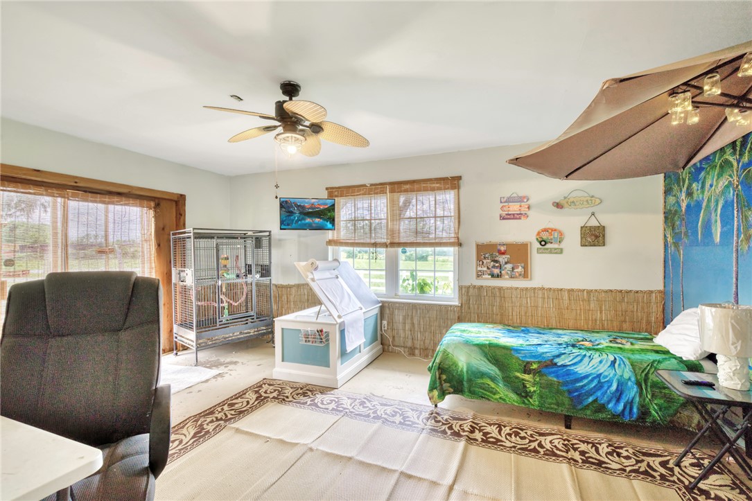 1681 Union Road Madisonville, TX 77864 - Photo 22 of 50 a living room with furniture and a large window