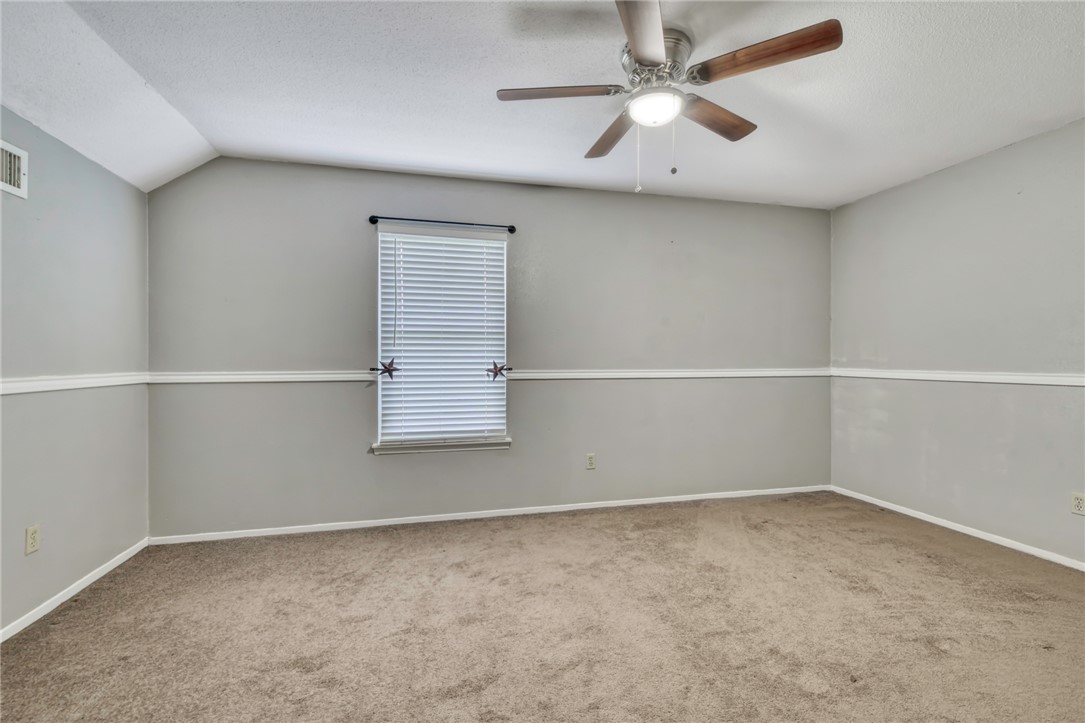 1681 Union Road Madisonville, TX 77864 - Photo 27 of 50 an empty room with a empty space and a ceiling fan