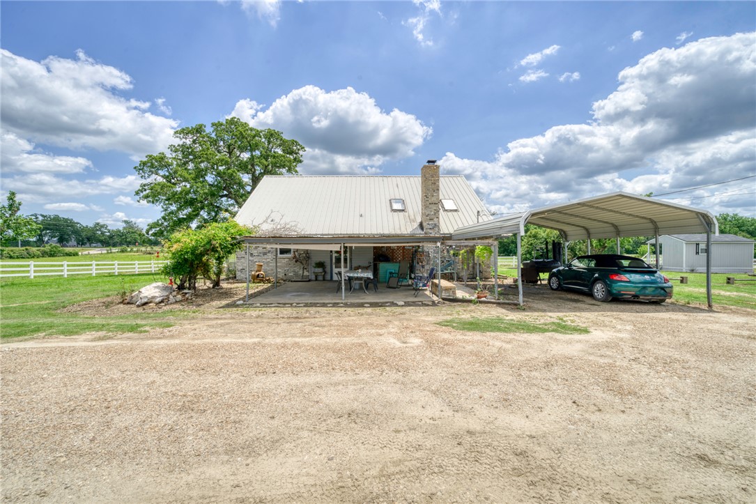 1681 Union Road Madisonville, TX 77864 - Photo 29 of 50 a view of a house with a yard
