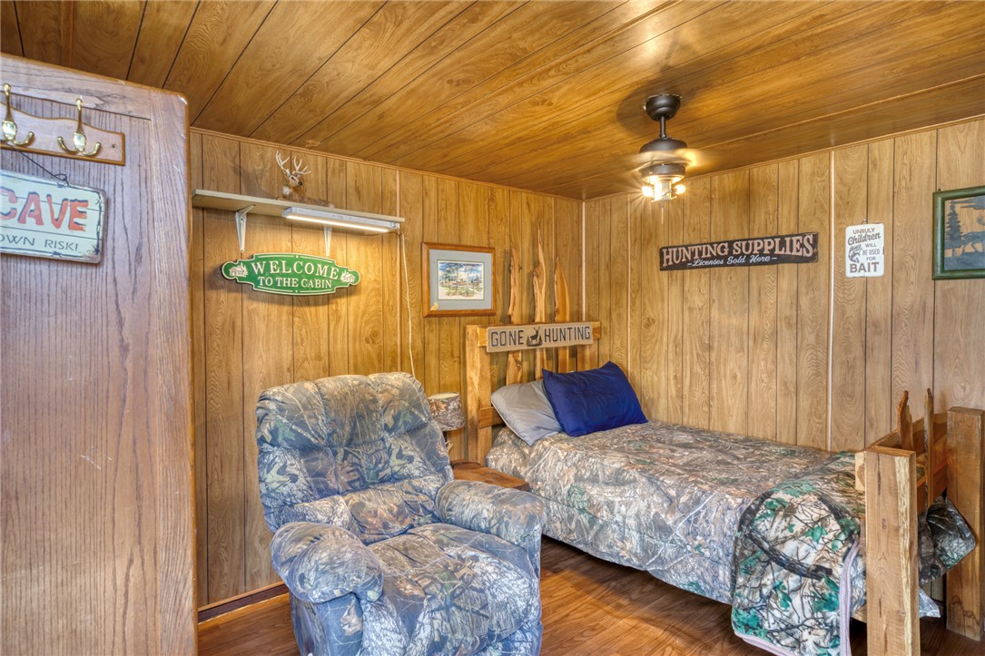 1681 Union Road Madisonville, TX 77864 - Photo 31 of 50 a bedroom with furniture and a bed