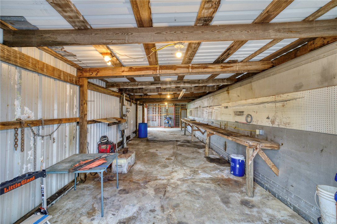 1681 Union Road Madisonville, TX 77864 - Photo 45 of 50 a view of a garage room with wooden furniture