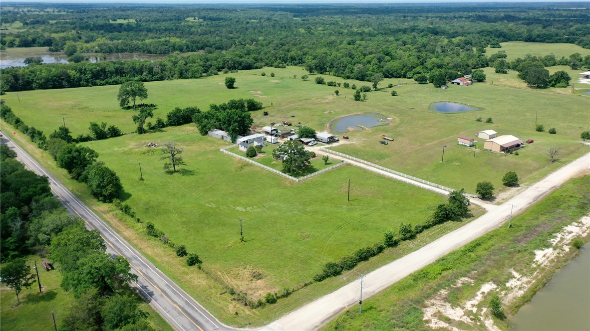 1681 Union Road Madisonville, TX 77864 - Photo 48 of 50 a view of a garden with a lake