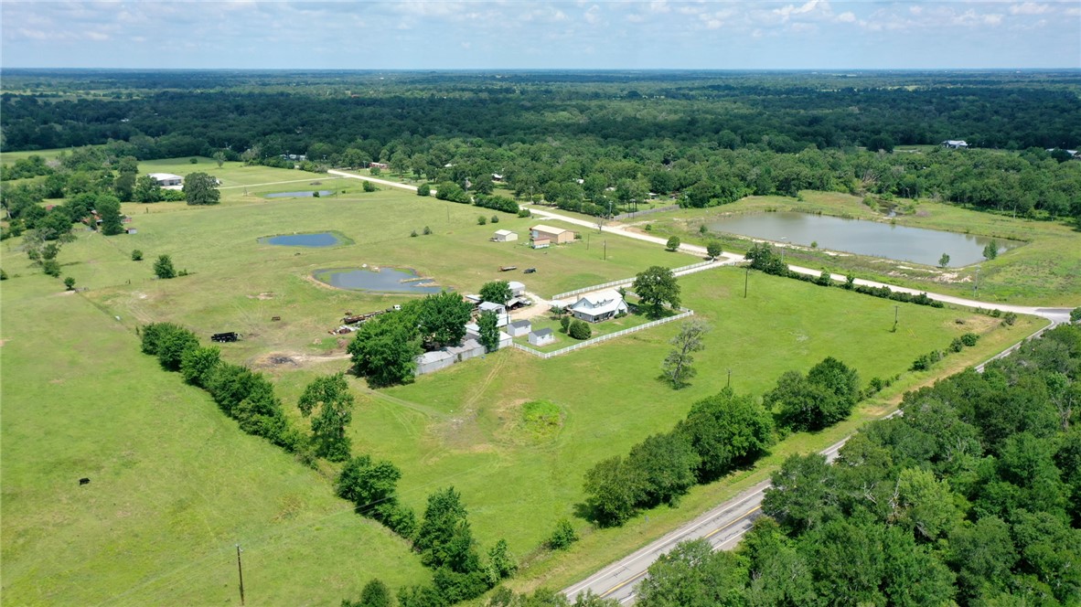 1681 Union Road Madisonville, TX 77864 - Photo 49 of 50 a view of a lake with a yard