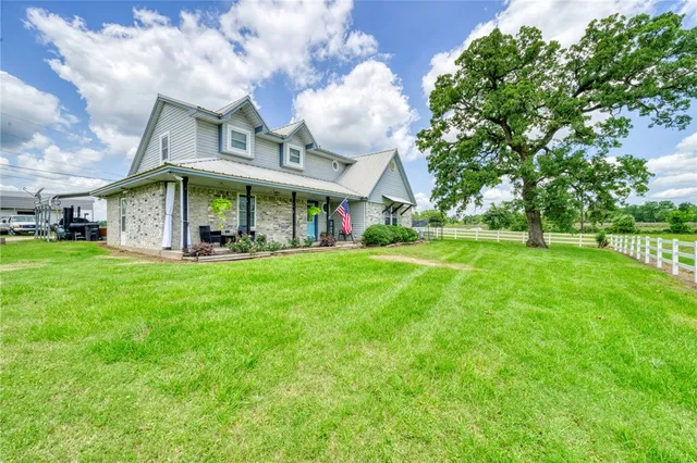 a front view of house with yard