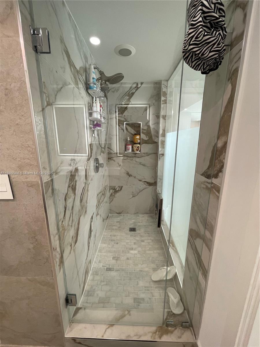 92 Southwest 3rd Street, Unit 1602 Miami, FL 33130 - Photo 18 of 48 a view of a hallway with wooden floor and door