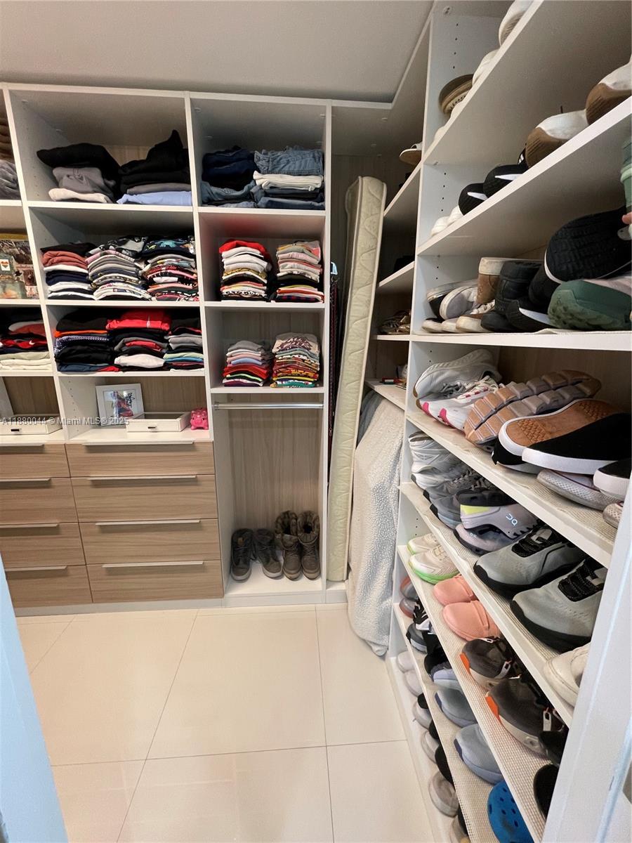 92 Southwest 3rd Street, Unit 1602 Miami, FL 33130 - Photo 21 of 48 a view of walk in closet