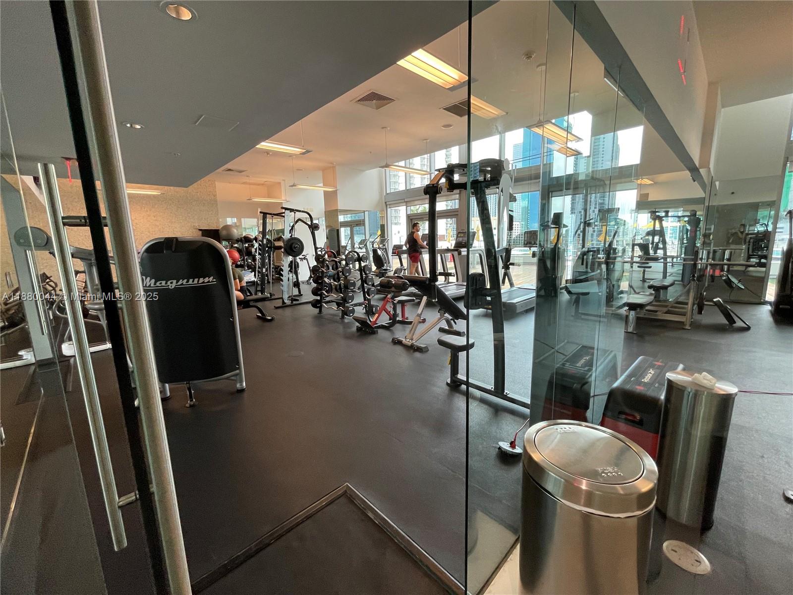 92 Southwest 3rd Street, Unit 1602 Miami, FL 33130 - Photo 38 of 48 a room with gym equipment