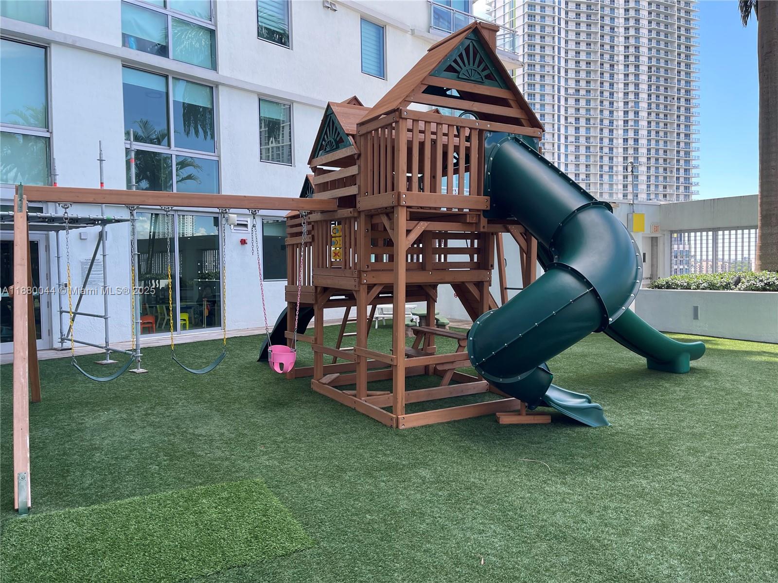 92 Southwest 3rd Street, Unit 1602 Miami, FL 33130 - Photo 45 of 48 a view of a house with a yard