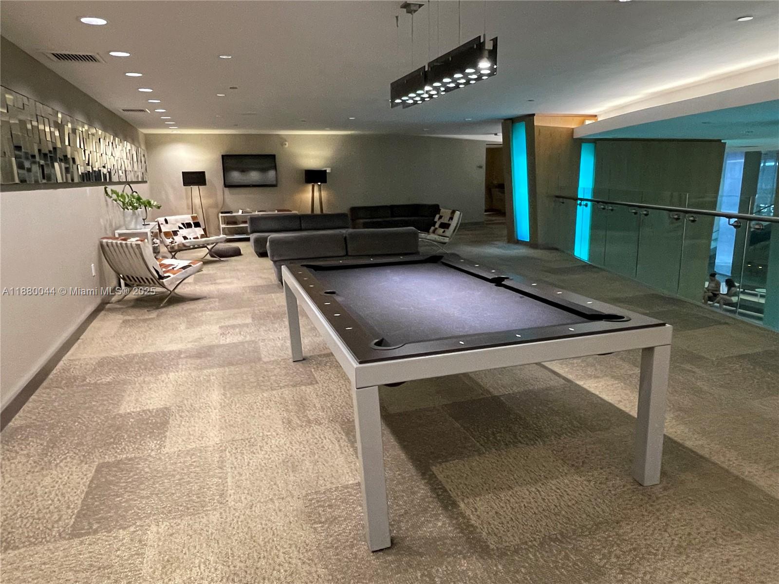 92 Southwest 3rd Street, Unit 1602 Miami, FL 33130 - Photo 48 of 48 a kitchen with stainless steel appliances granite countertop a stove a sink and a refrigerator