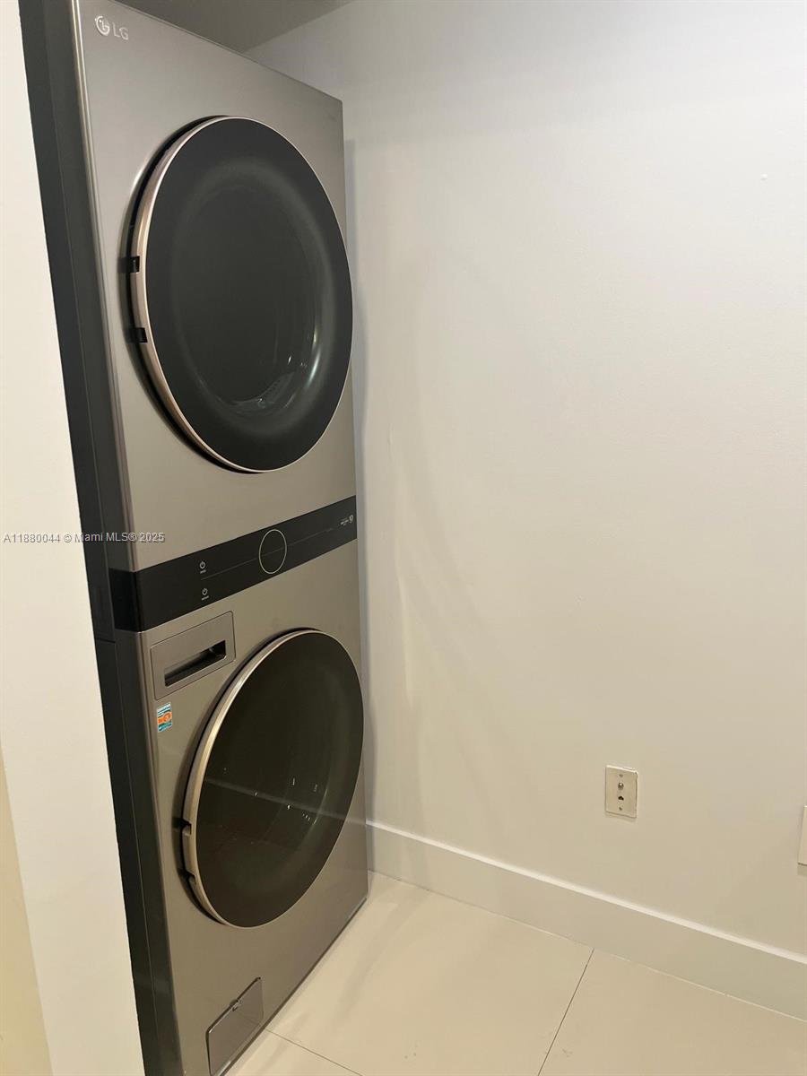 92 Southwest 3rd Street, Unit 1602 Miami, FL 33130 - Photo 6 of 48 a close up view of a washer and dryer