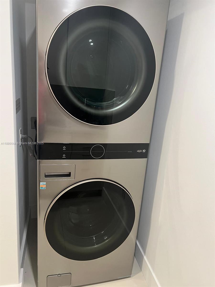 92 Southwest 3rd Street, Unit 1602 Miami, FL 33130 - Photo 7 of 48 a close up view of washer and dryer