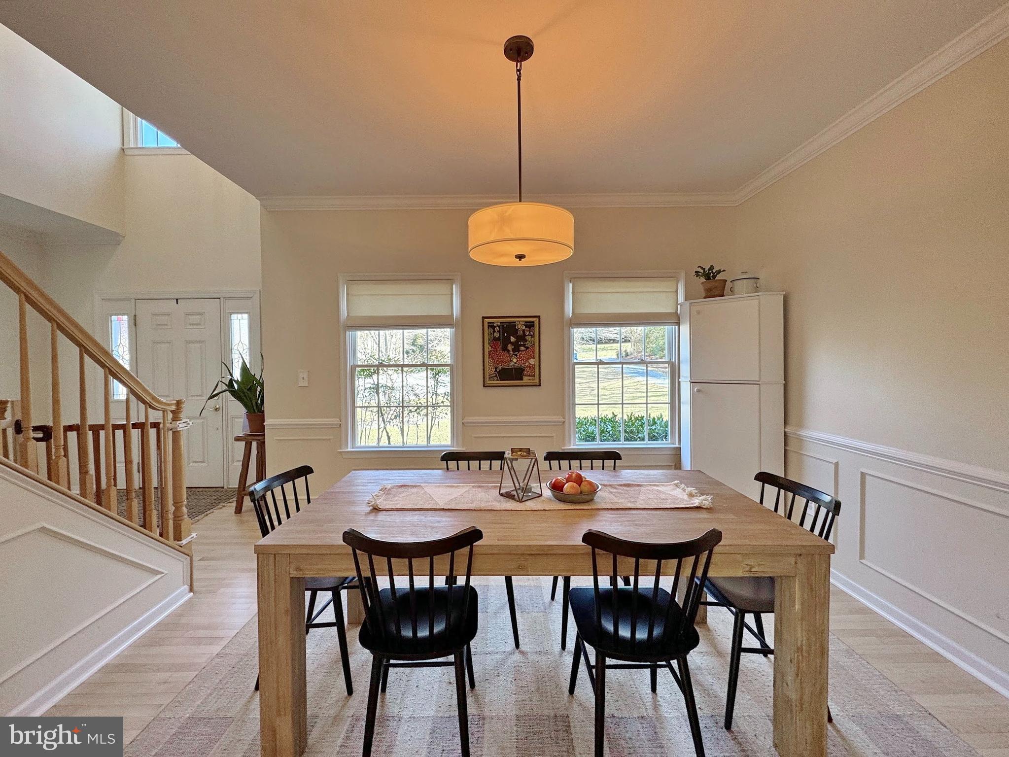 4060 Loving Drive Dunkirk, MD 20754 - Photo 32 of 83 a view of a dining room with furniture window and wooden floor