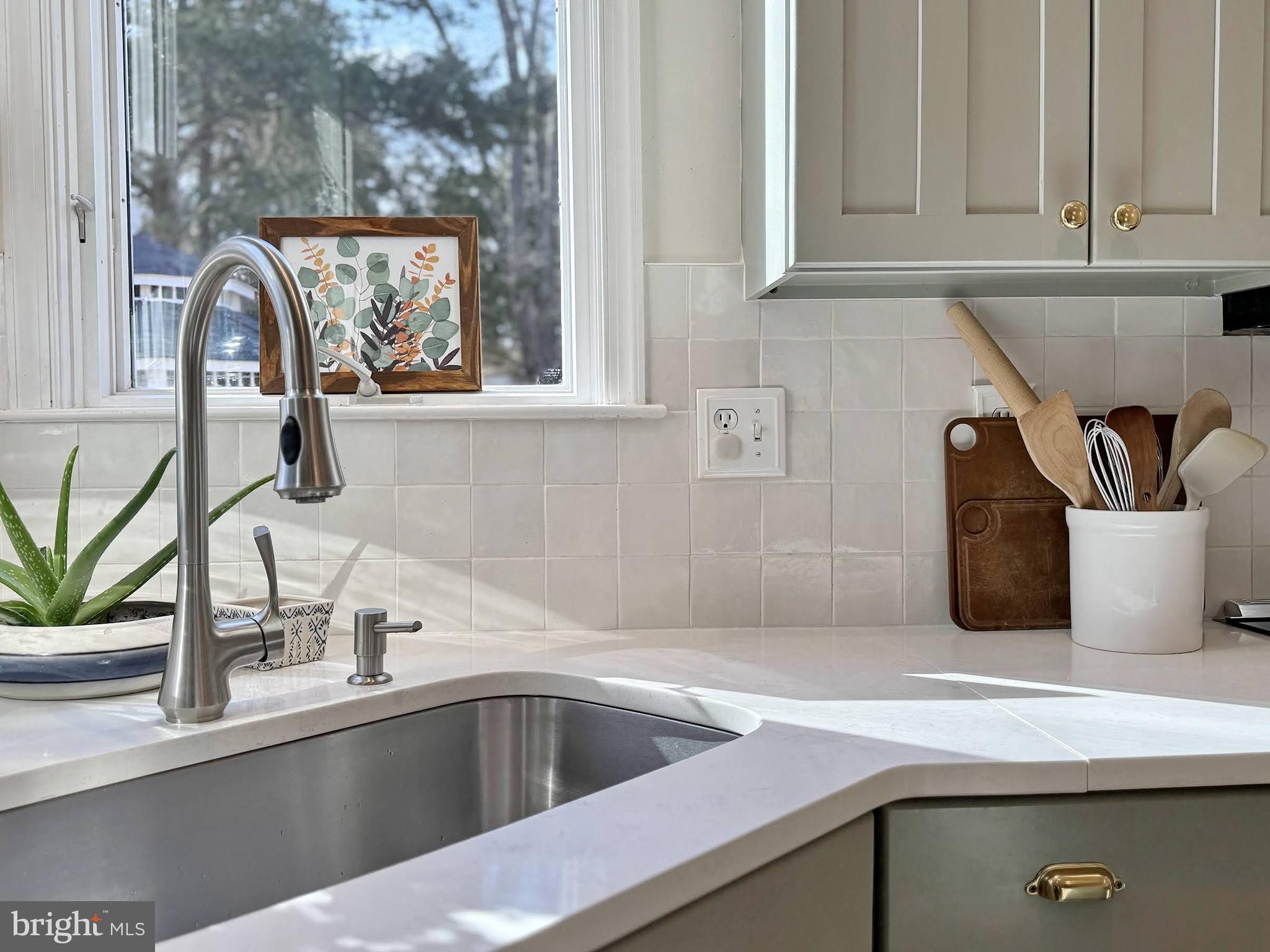4060 Loving Drive Dunkirk, MD 20754 - Photo 37 of 83 a kitchen with a sink and a granite counter tops