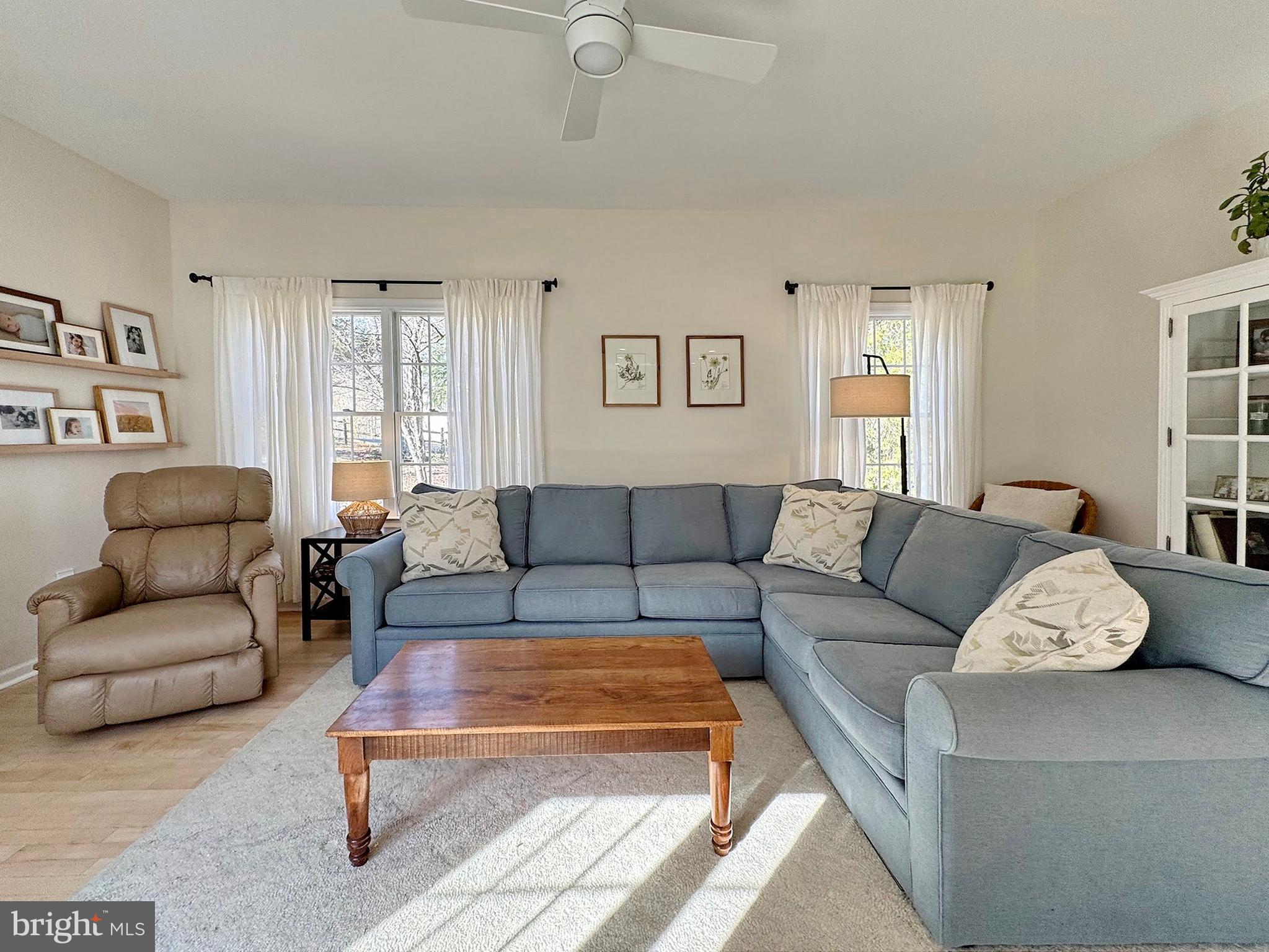 4060 Loving Drive Dunkirk, MD 20754 - Photo 52 of 83 a living room with furniture potted plant and a window