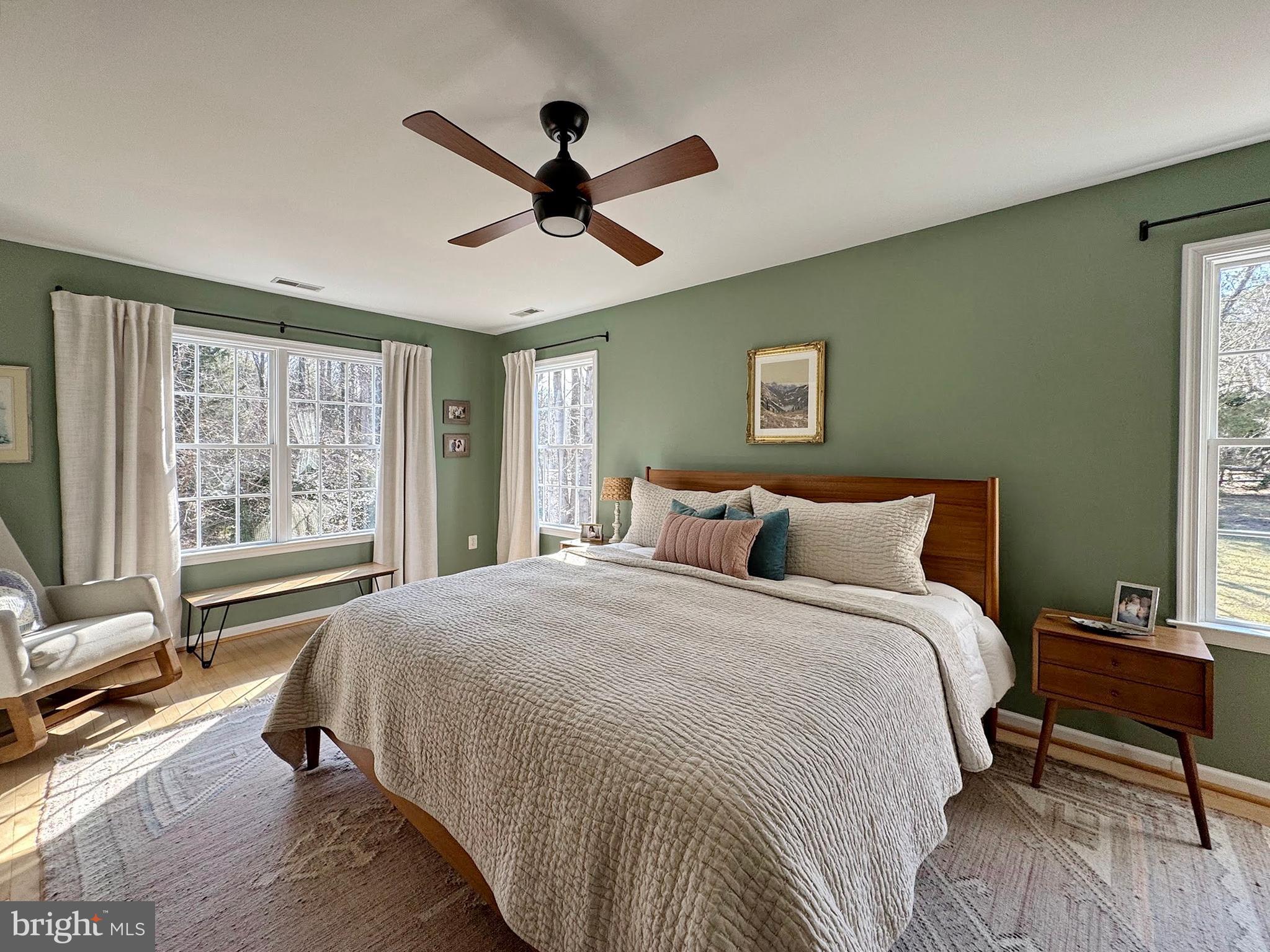 4060 Loving Drive Dunkirk, MD 20754 - Photo 64 of 83 a bedroom with a large bed and a large window