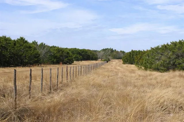a view of lake with mountain in the background