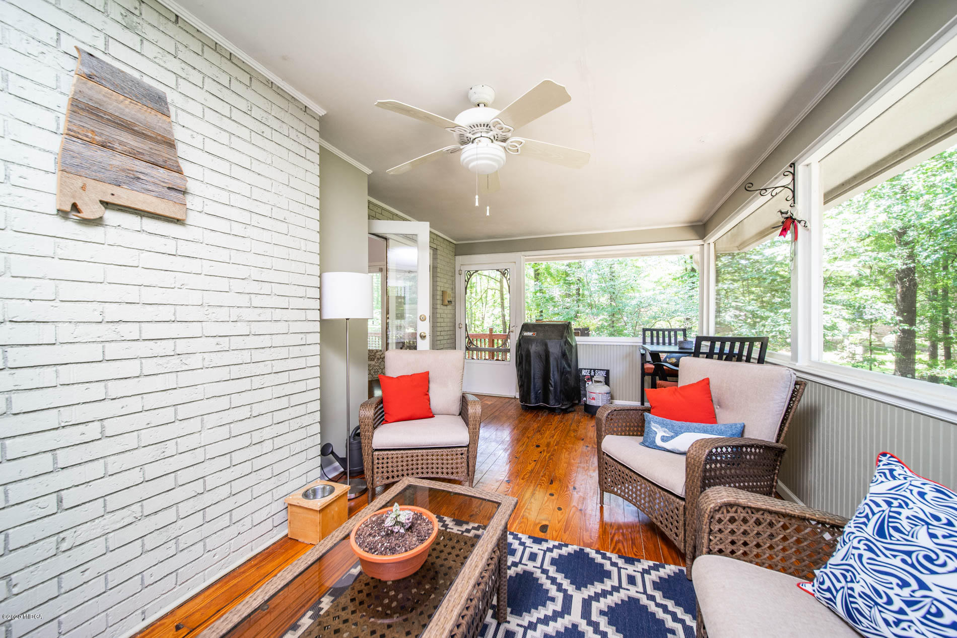 245 Beacon Hill Road Macon, GA 31210 - Photo 11 of 39 a living room with patio furniture and a potted plant