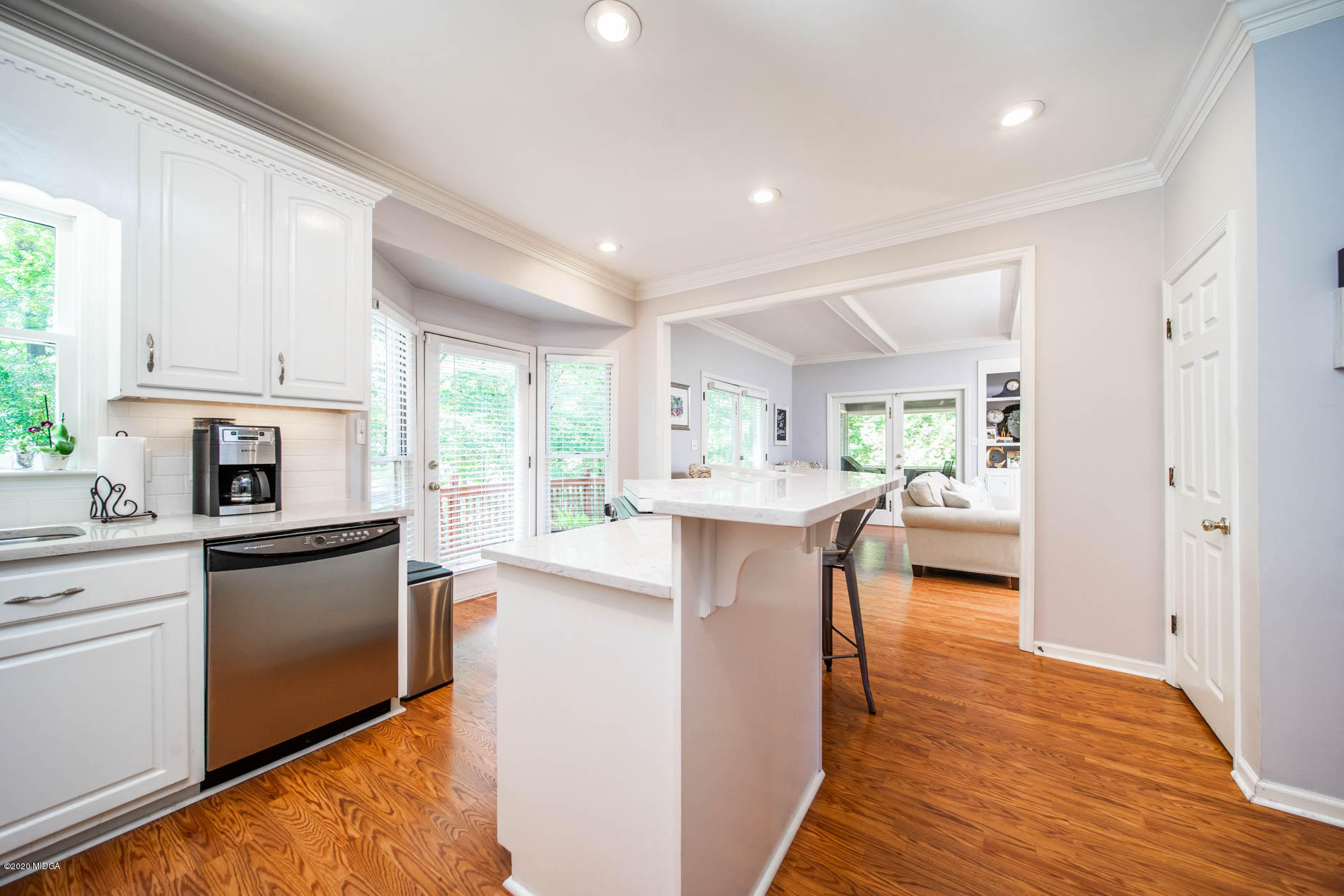 245 Beacon Hill Road Macon, GA 31210 - Photo 16 of 39 a kitchen with kitchen island granite countertop lots of counter top space and appliances